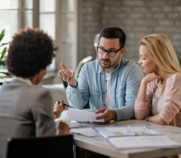 Insurance advisor comparing policy details